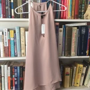 Dressy tunic top, halter style. Draped back.